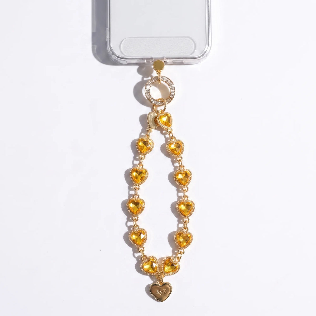 Heartstring phone charm strap in Gold