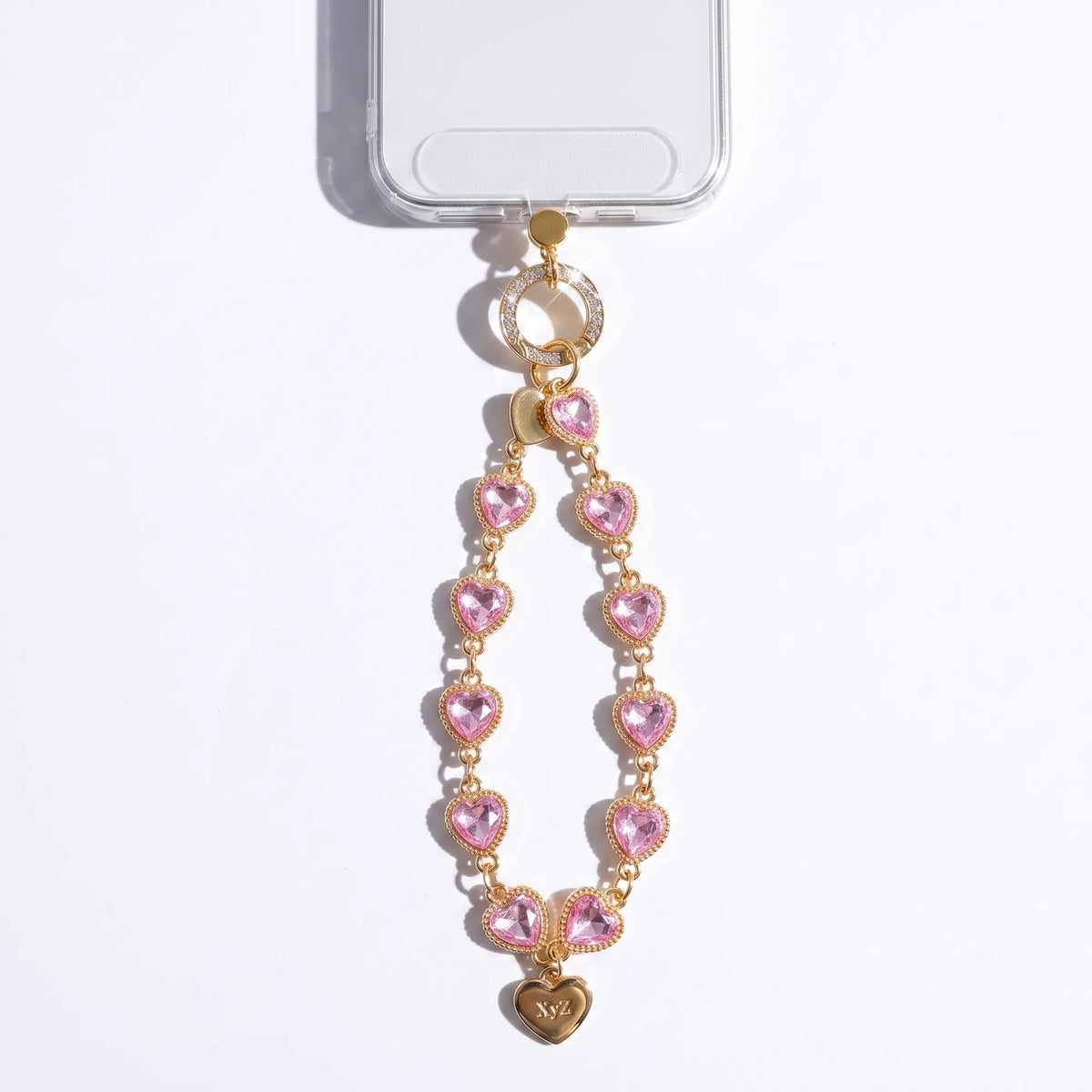 Heartstring crystal heart phone charm wristlet strap that clips to any phone case