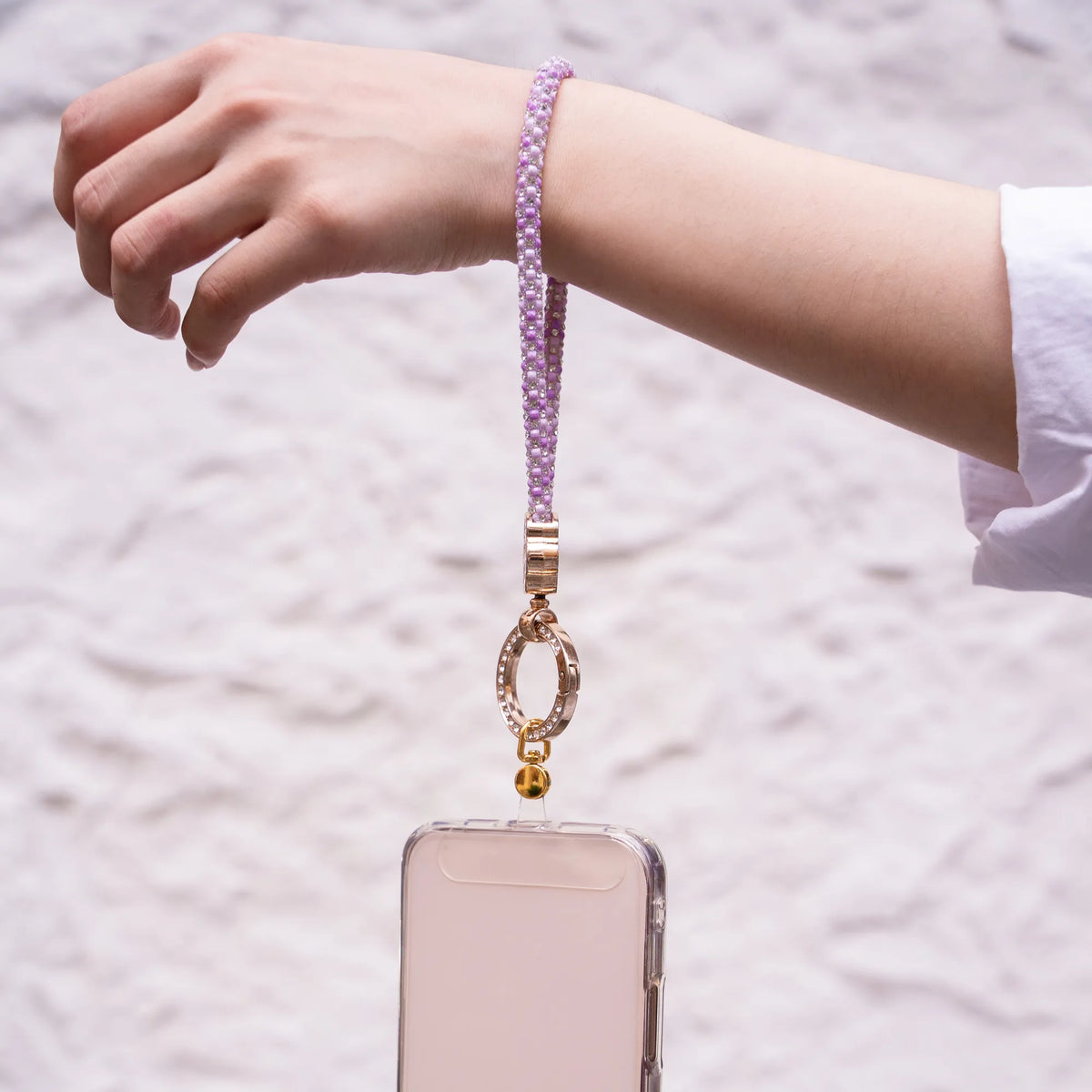 Pawfect charm strap in Light Purple, worn on the wrist - all-groups