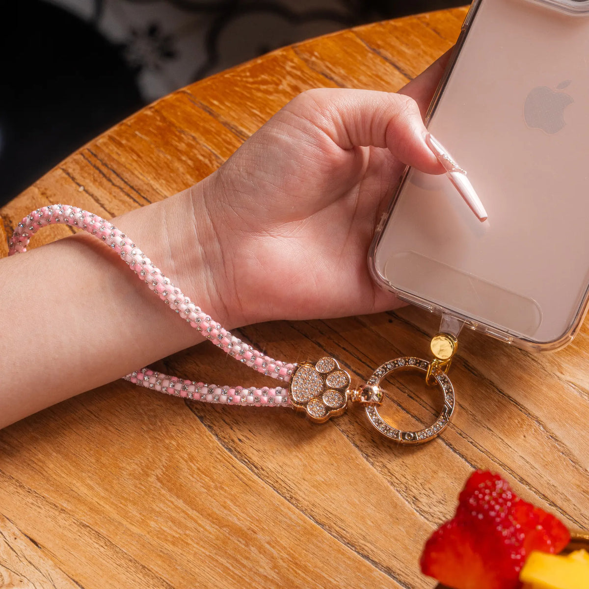 Pawfect charm strap in Pink, worn on the wrist - all-groups