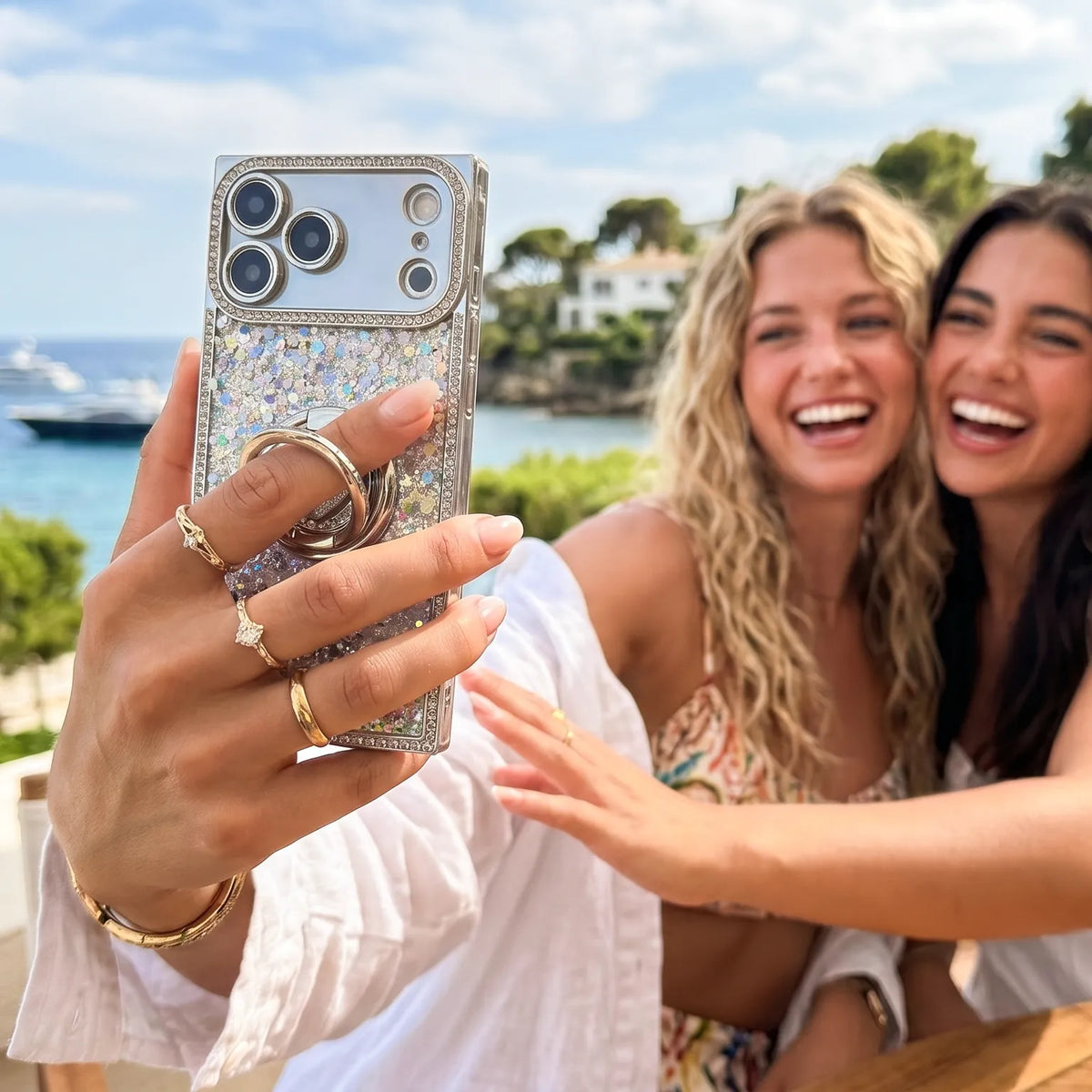 XYZ Sparkle Stones Set — crystal-lined edges with dual ring stand and braided lanyard, taking a selfie all-groups